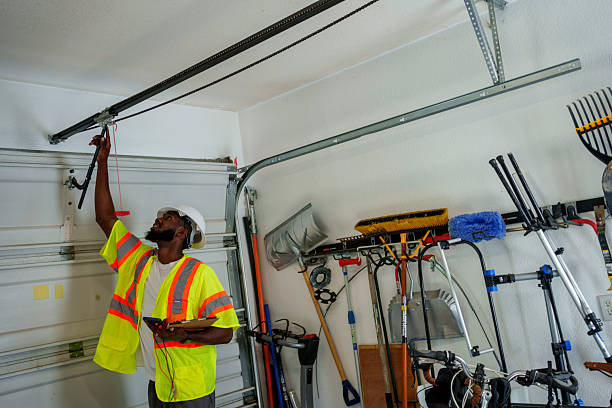 Professional Garage Door Panel Replacement technician working in Buncombe County County, NC